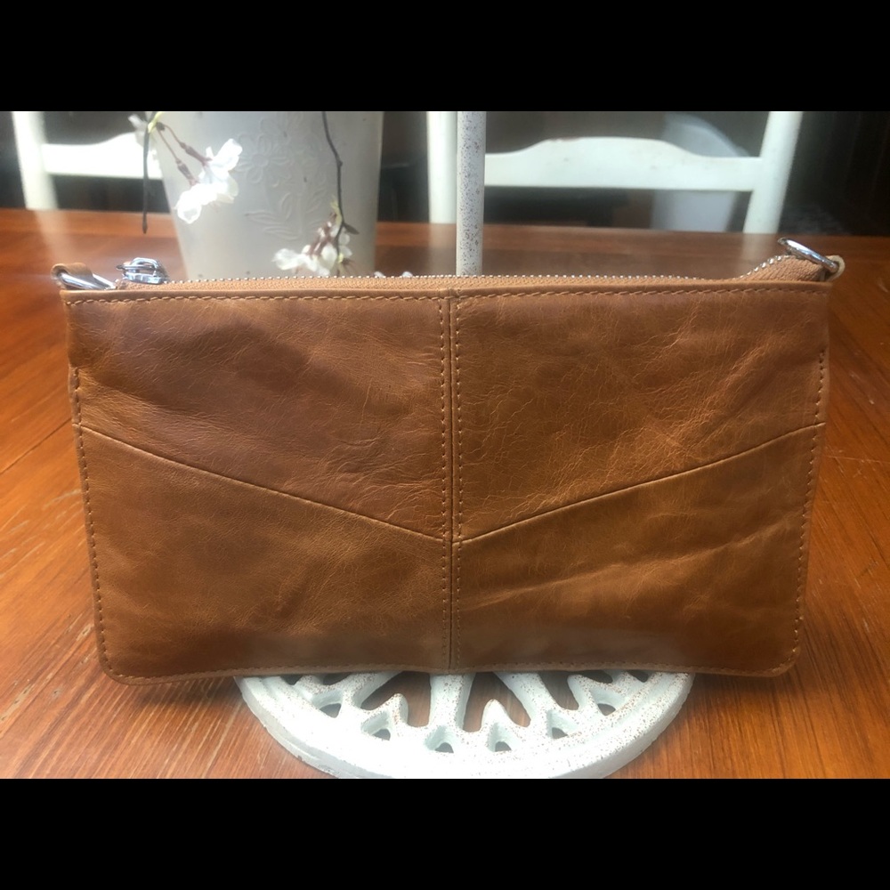 Lecxci leather clutch